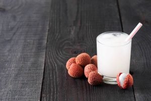 some lychees with a glass of milk